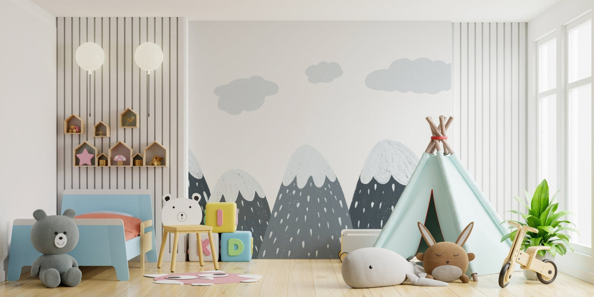 Mountain peak wall mural for a kids bedroom with natural wood furniture and toys.