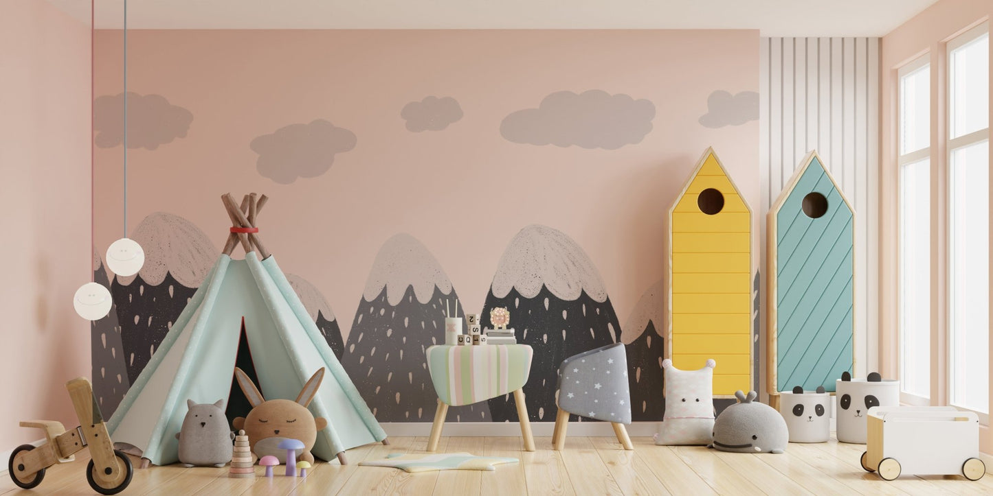 Grey and white mountain mural used as a feature wall in a bright playroom.