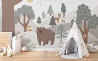 Scandinavian forest wall mural with animal illustrations and a white teepee.