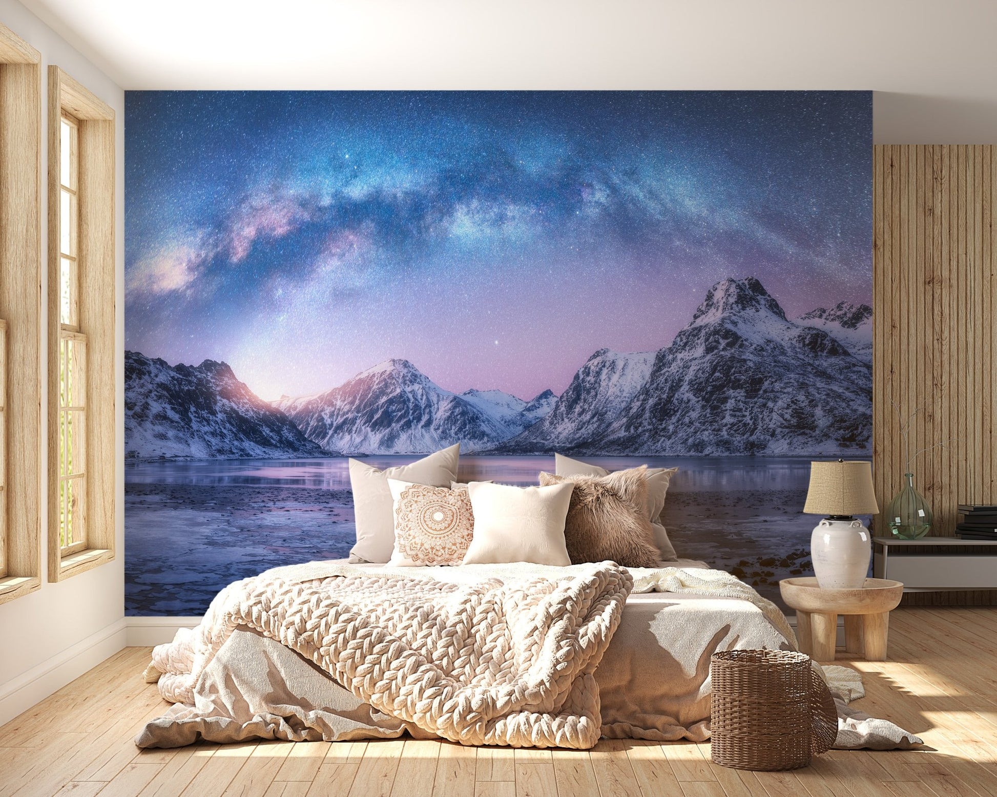 Pink and blue mountain range wall mural in a bright bedroom.