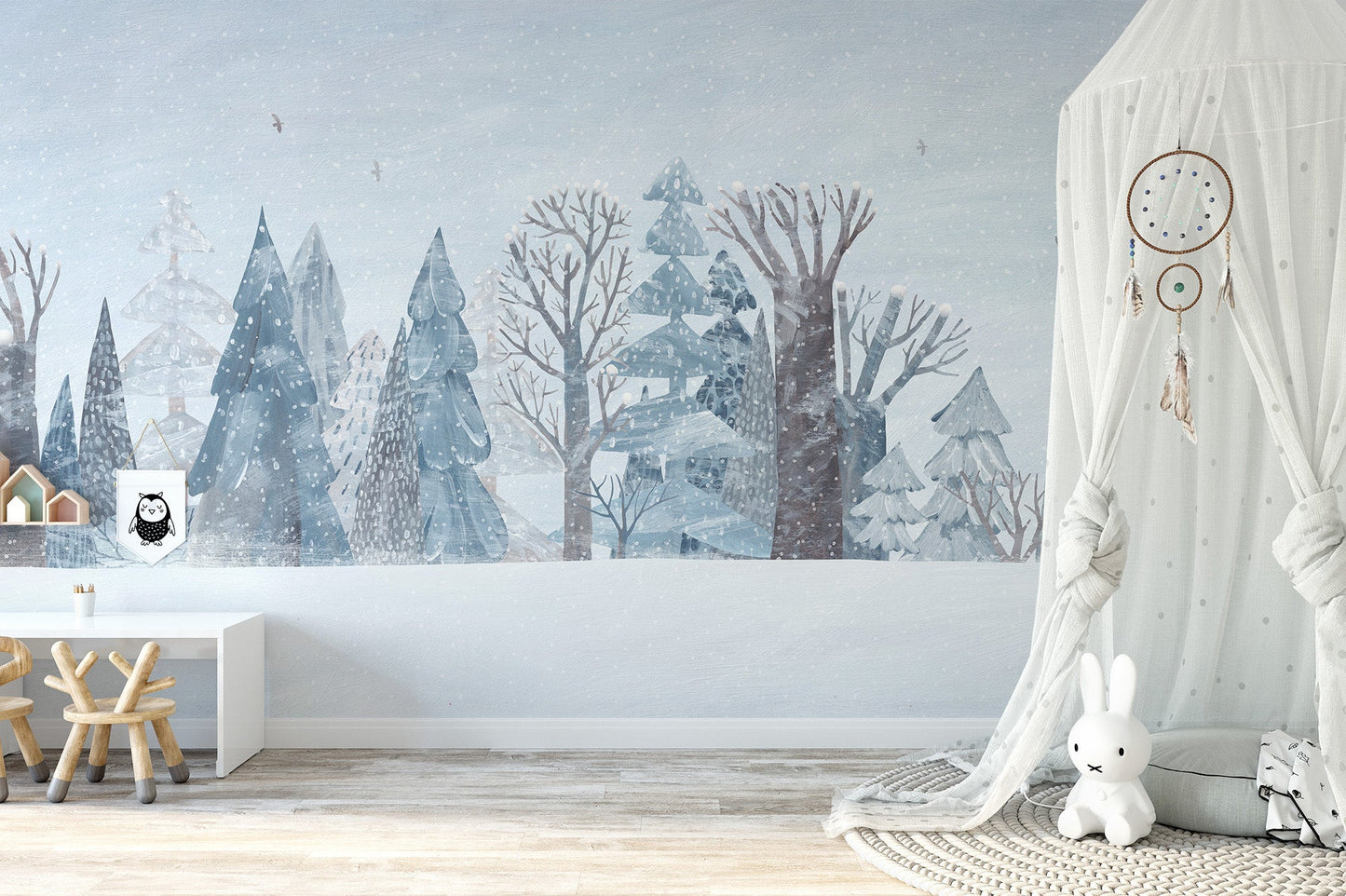 Minimalist winter woodland wall mural with falling snow illustration.