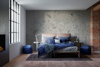 Subtle meadow wallpaper mural with small birds in motion.