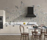 Soaring birds wallpaper mural with beige and blue botanical pattern.