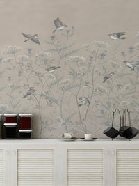 Elegant bird wallpaper mural in muted earth tone color palette.