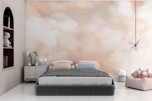 Dreamy peach sky wallpaper with soft white clouds.