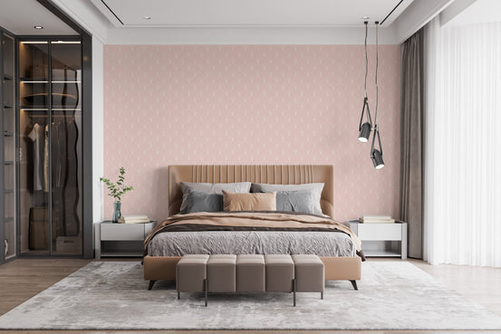 Textured pink wallpaper behind a wooden bed with hanging bedside lights.