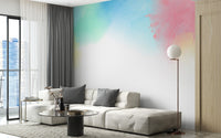 Soft rainbow mural wallpaper featuring airy watercolor texture.