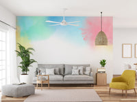 Artistic rainbow gradient mural wallpaper in muted pastel tones.