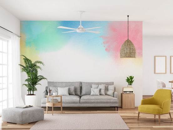Artistic rainbow gradient mural wallpaper in muted pastel tones.