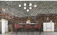 Urban dining room design with red and grey brick wall mural.