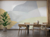Contemporary wall mural featuring beige, sage, and gray shapes.