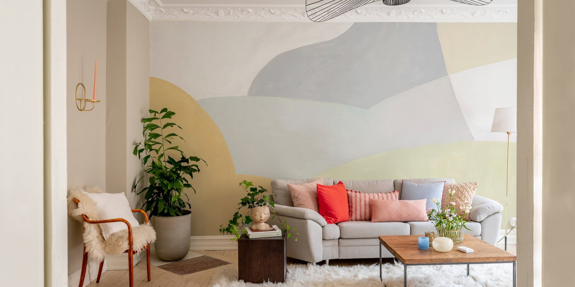 Soothing shapes wallpaper mural in pastel yellow and gray abstract design.