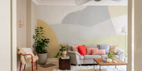 Soothing shapes wallpaper mural in pastel yellow and gray abstract design.