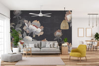 Living room setup with a grey sofa and oasis floral mural on the main accent wall.