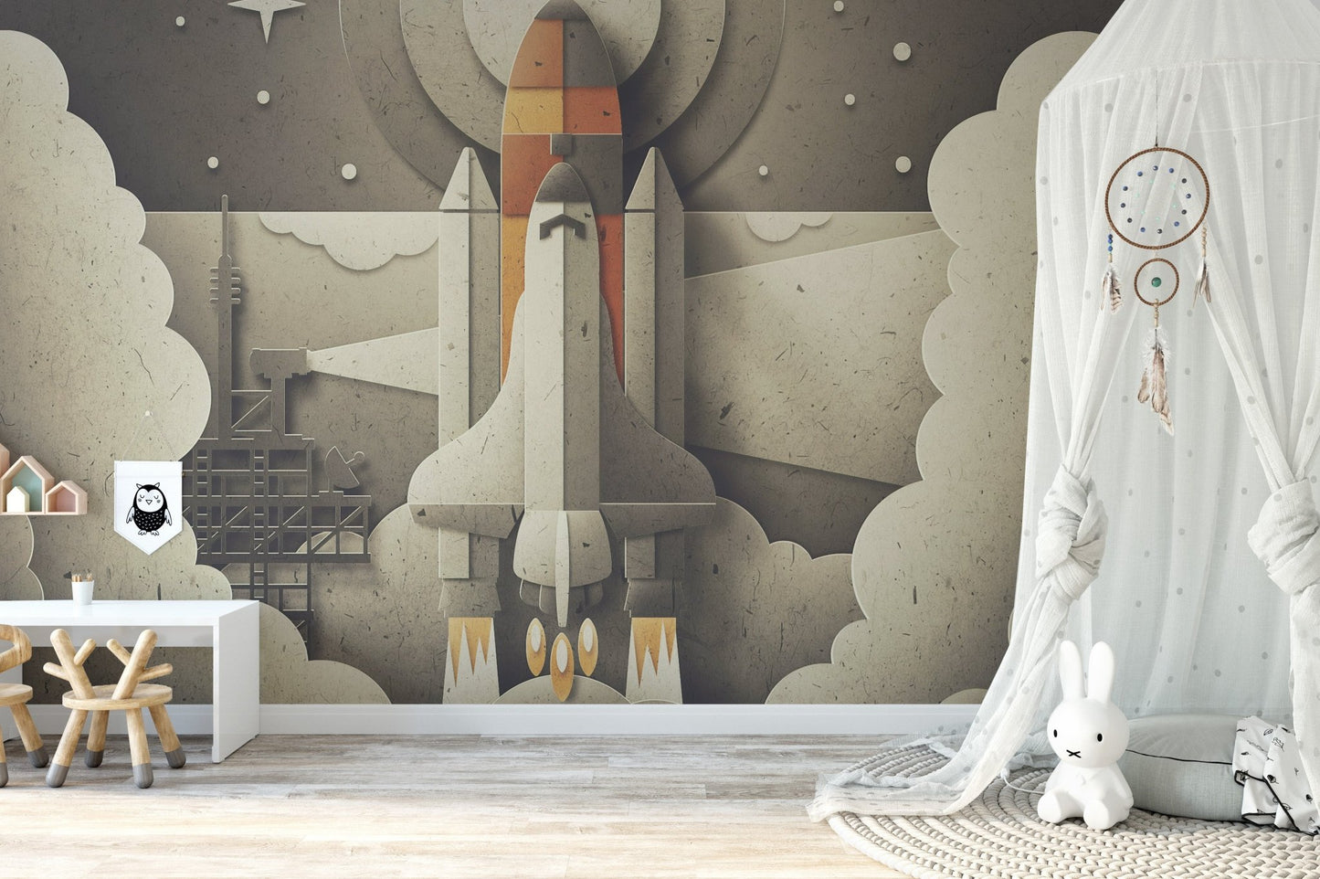 Space launcher wall mural in a modern nursery with a hula hoop and rainbow decor.