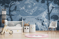 Spirit Night Blue Wall Mural in a nursery with a white wooden crib and toy bike.