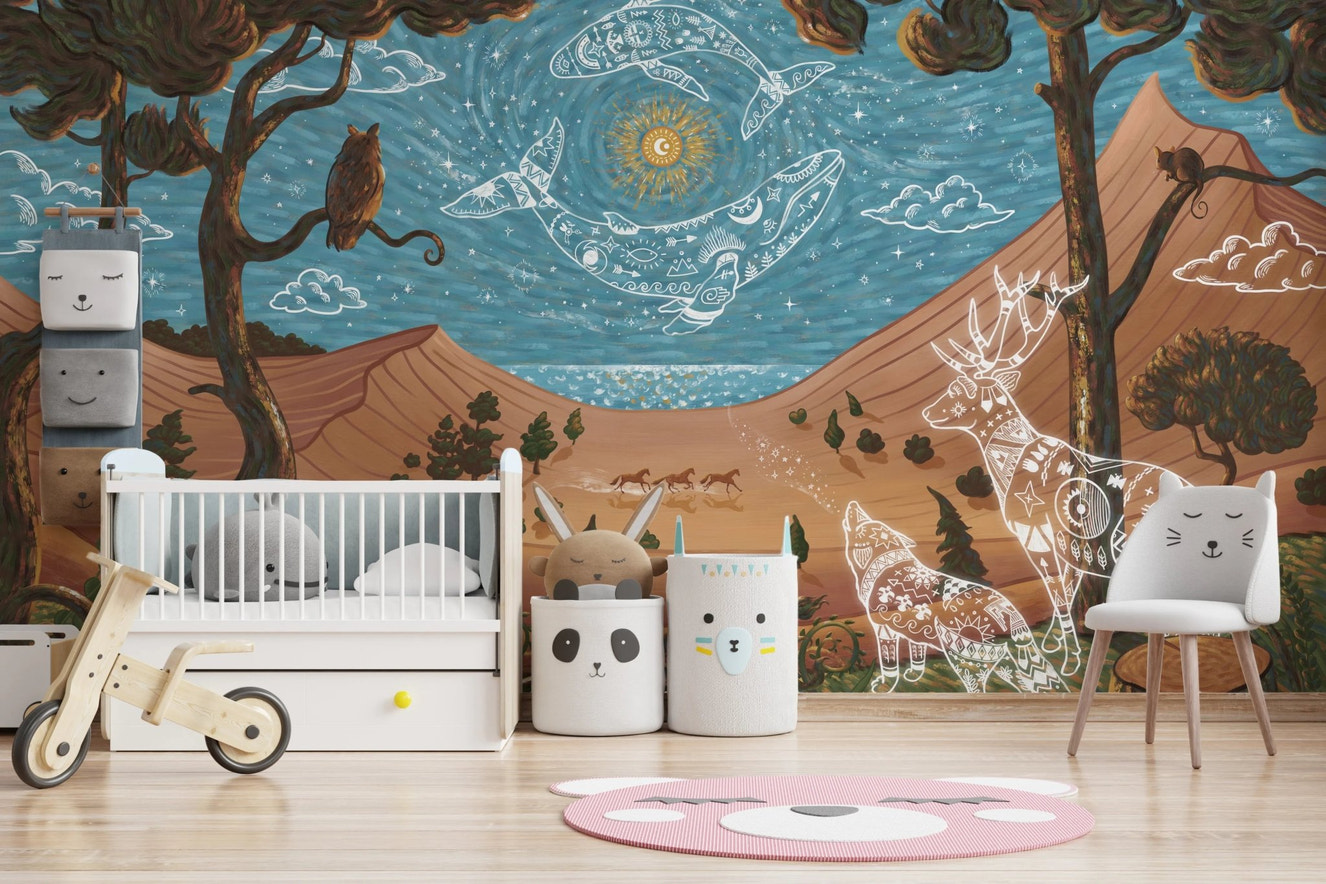 Kids room spirit wall mural showing a white crib against a blue and brown mountain mural.