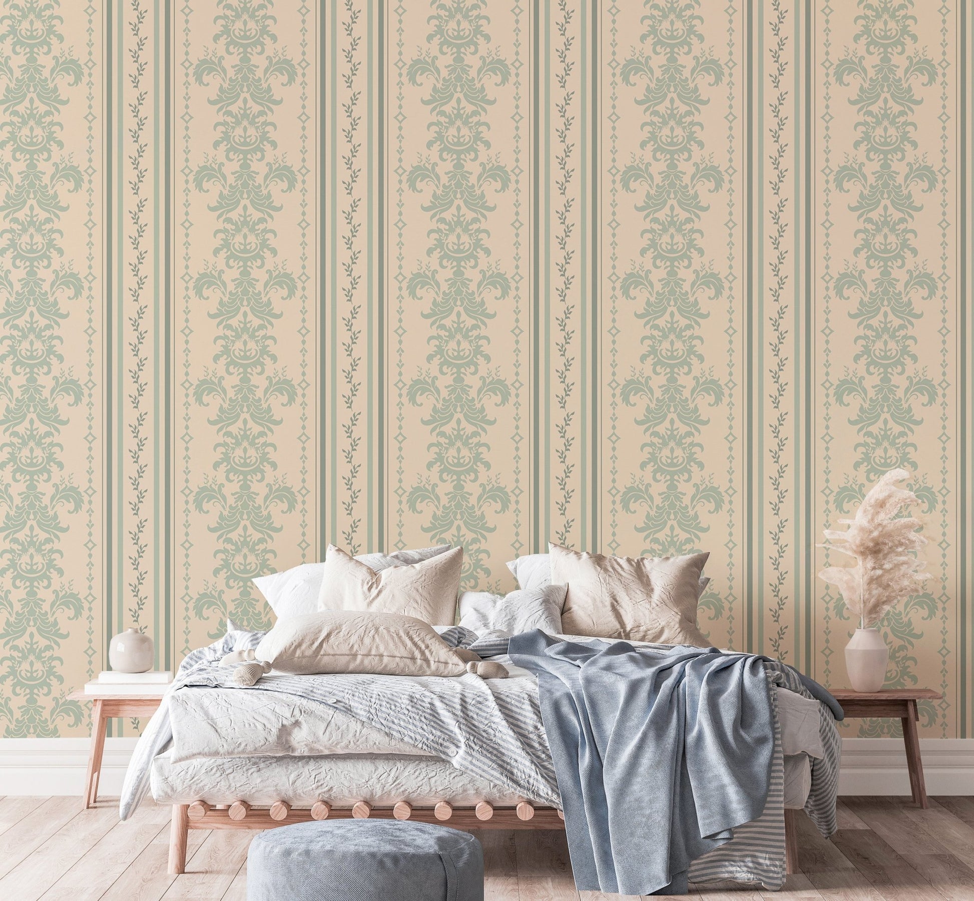 Sage green and beige damask wallpaper in a master bedroom with neutral linens.