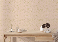 Pastel moon and star wall mural used in a workspace with a wooden desk.