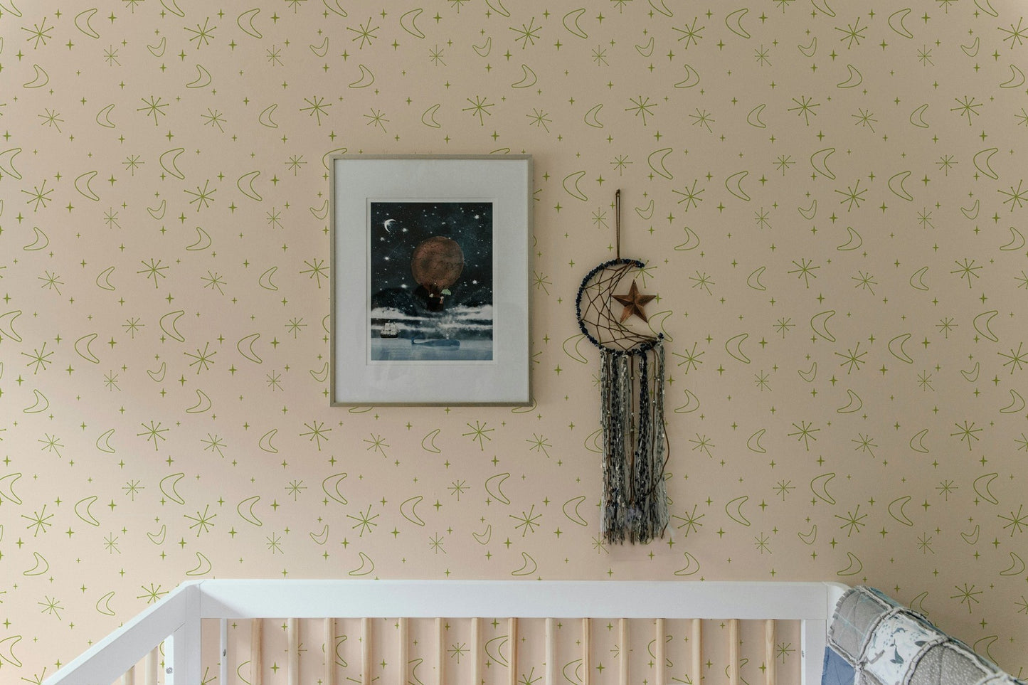 Stars and Moons Pastel Background Old Vintage Wall mural in a nursery with wooden crib