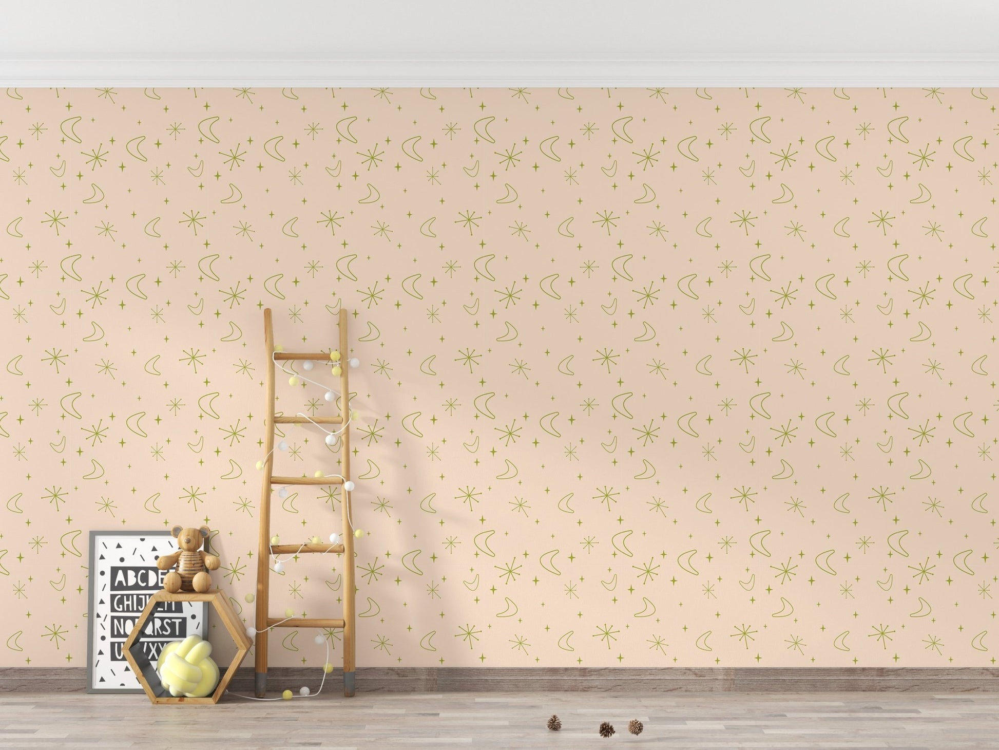 Star pattern wall mural behind a wooden ladder and toys in kids room.