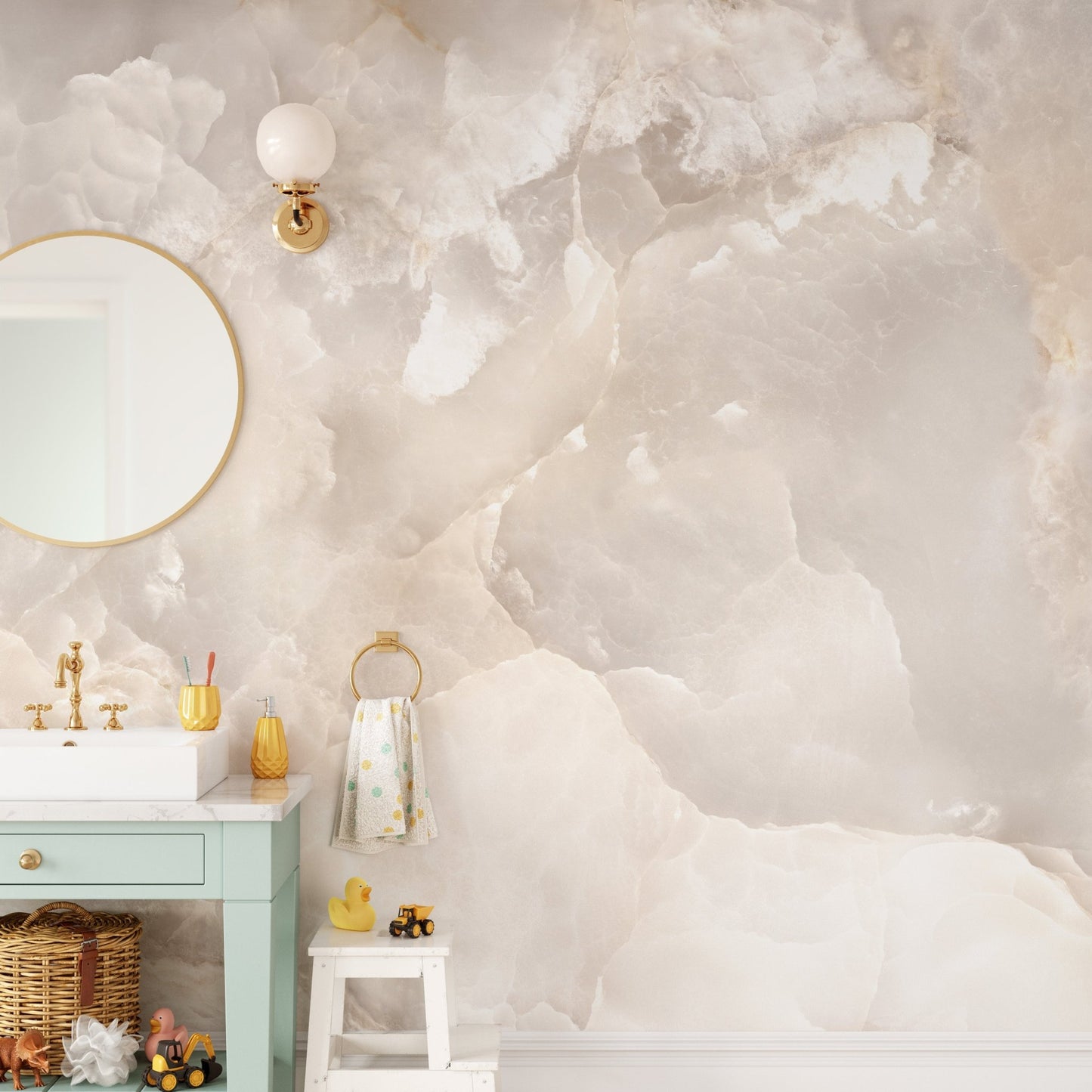 Stone glitter wall mural in a bathroom with a gold mirror and green vanity.