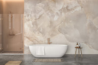 Beige stone wall mural in a modern bathroom with a freestanding tub.