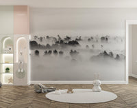 Artistic mural with stormy silhouettes creating a moody ambiance in kids room.
