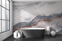 Gray and white marble wall mural in a bathroom with a black floor.