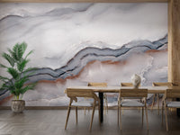 Striking White Clouded Marble mural in a dining area with a table and plant.