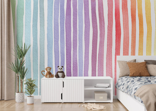 Striped Rainbow Splash Wallpaper in a modern kids' bedroom with white furniture.