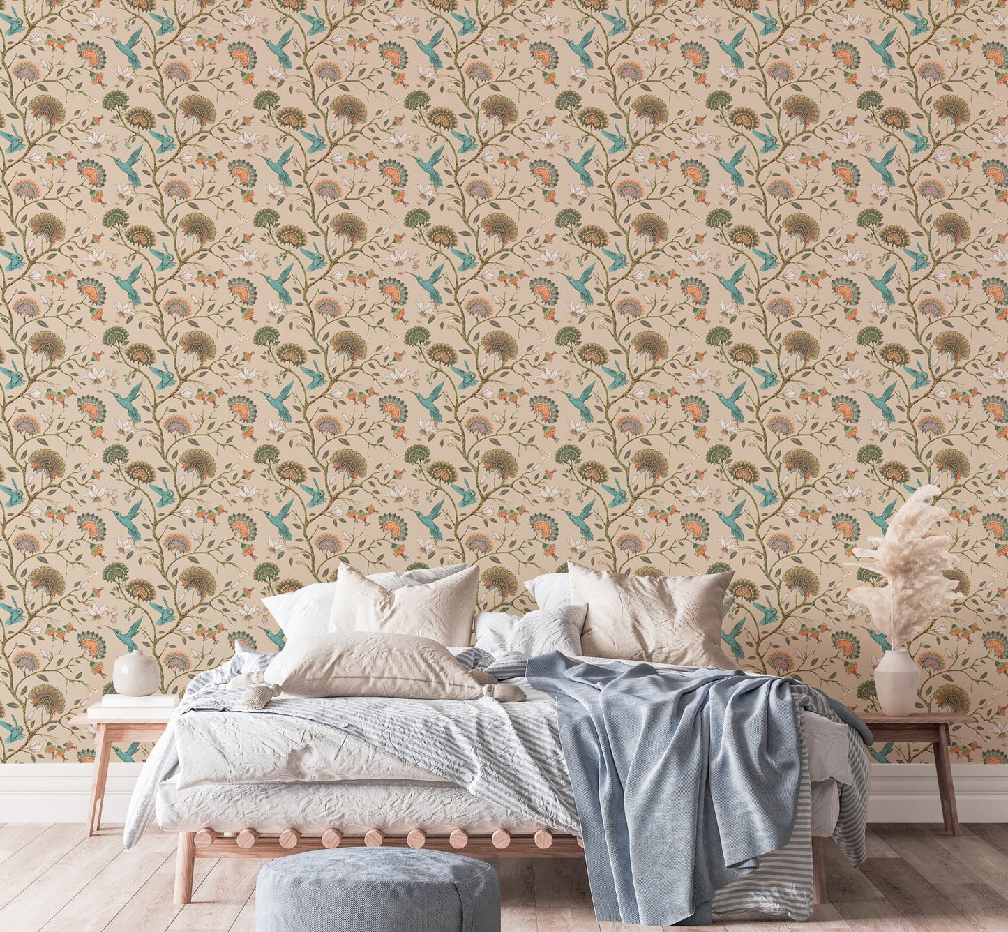 Beige floral garden wallpaper in a bedroom with a white bed and brown blanket.