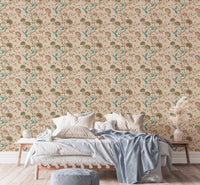 Beige floral garden wallpaper in a bedroom with a white bed and brown blanket.