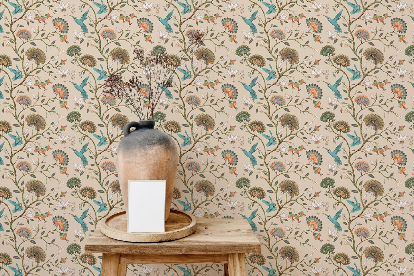 Garden themed wallpaper with teal birds and brown flowers on a neutral wall.