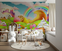 Nursery wall decor featuring soft rainbow and confection details.