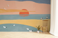 Decorative beach wallpaper with simple silhouettes of birds and water.