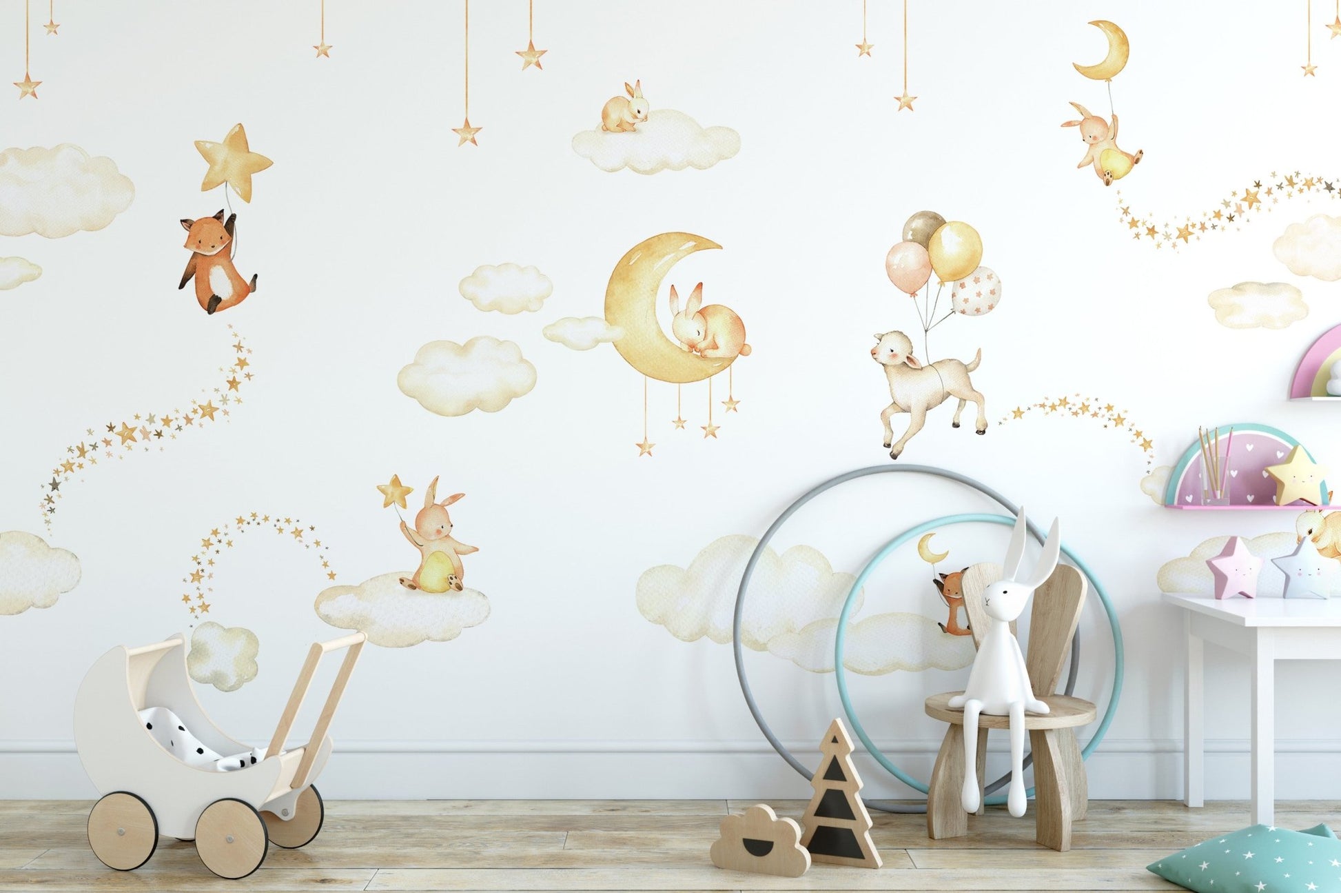Whimsical star and moon themed sweet wall mural in cream tones.