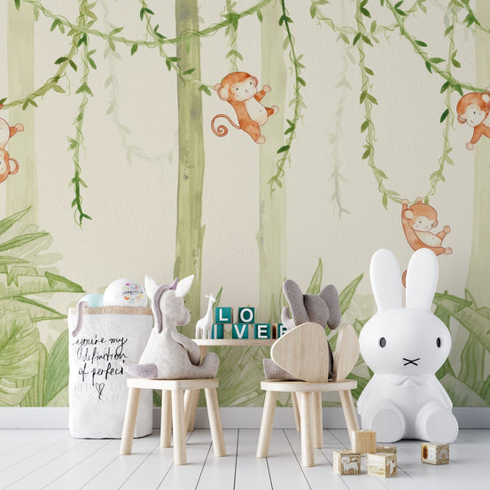 Swinging monkeys forest wallpaper mural with soft green jungle vines.