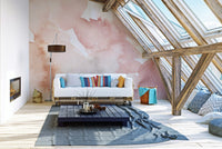 Elegant watercolor mural featuring soft pink wave patterns in attic living room.
