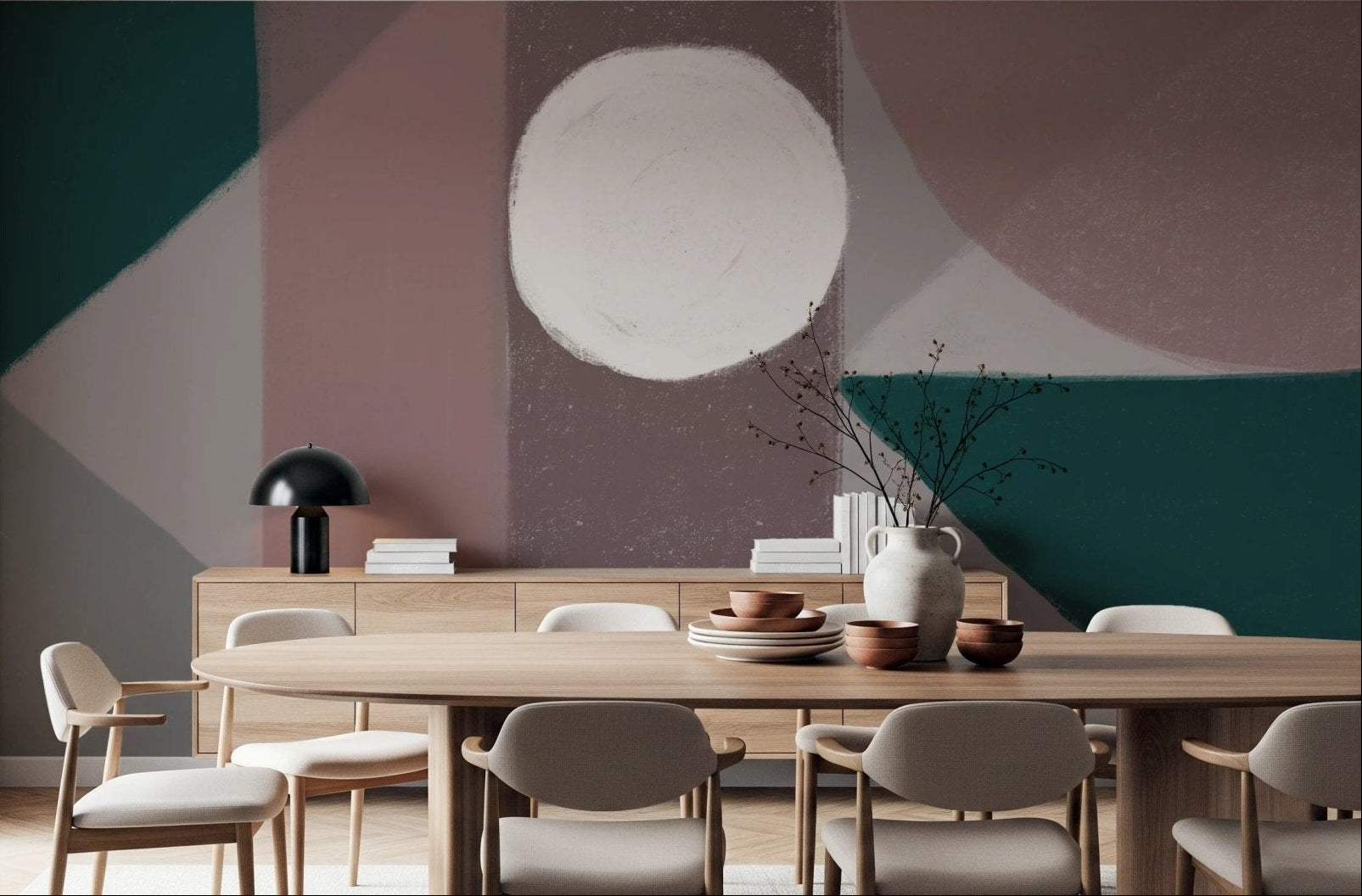 Long wooden dining table positioned before a geometric shape wall mural.