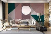 Modern living area with a grey rug and abstract geometric shape wall mural.