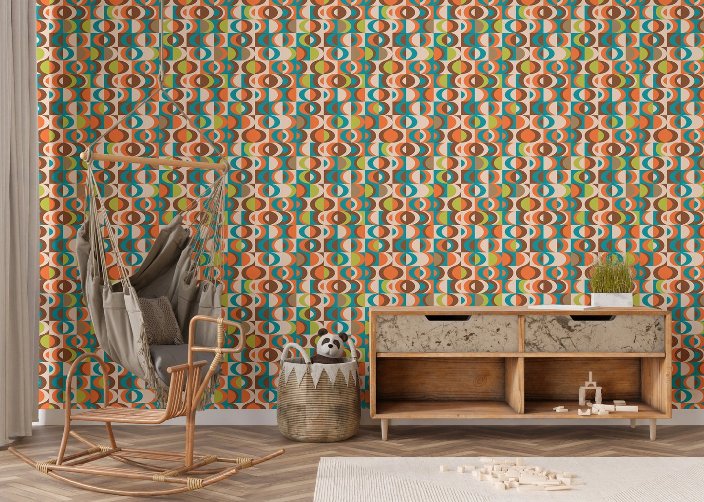 Mid Century vintage wall mural in a nursery area with a rocking chair and cabinet.