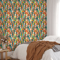 Mid Century wall mural on a bedroom wall with a brown throw blanket and white linen.