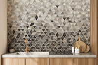 Kitchen counter with a geometric marble pattern wall mural in neutral shades.