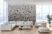 Bright living space featuring a grey and beige geometric tile wall mural.