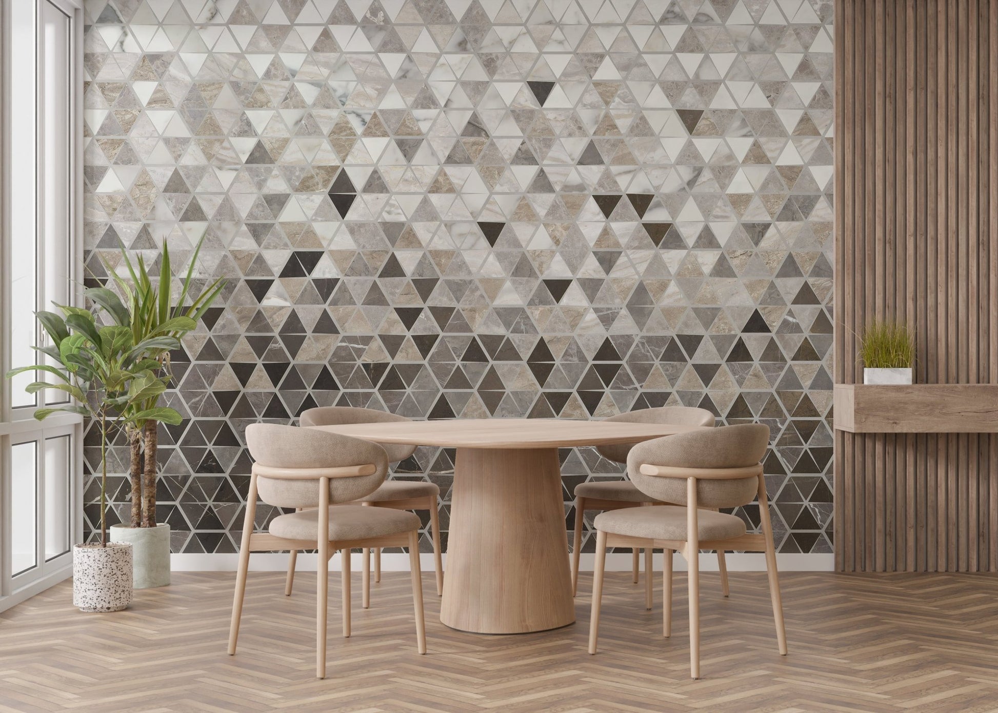 Round dining table set against a large scale marble tile wall mural.