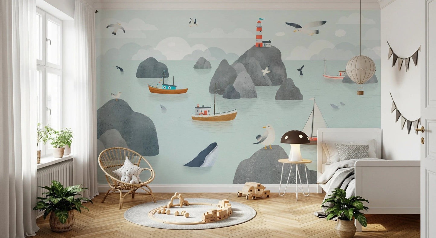 Coastal stories wall mural with boat motifs in a bright room with white curtains.