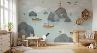 Seaside Stories Wall Mural in a spacious nursery with light wood flooring.