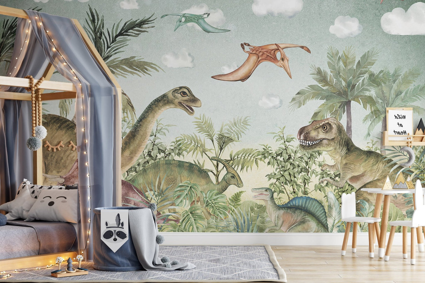 Jurassic period wall mural in a bedroom with house-shaped bed frame and rug.