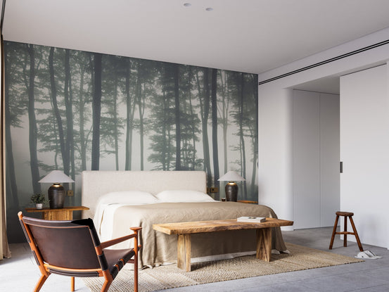 Towering Timberland Wall Mural in a bedroom with grey forest tree patterns